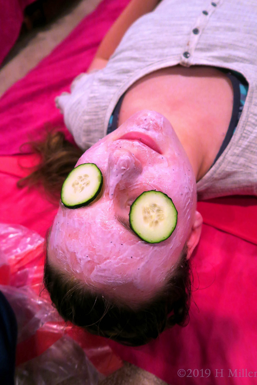 Lying On The Spa Mat And Enjoying Girls Facial Treatment Lying On The Spa Mat And Enjoying Girls Facial Treatment