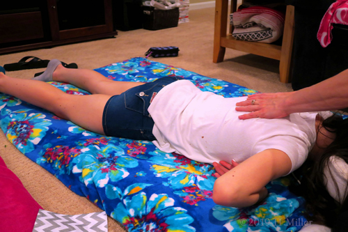 Spa Party Guest Is Enjoying A Massage For Kids. Spa Party Guest Is Enjoying A Massage For Kids.