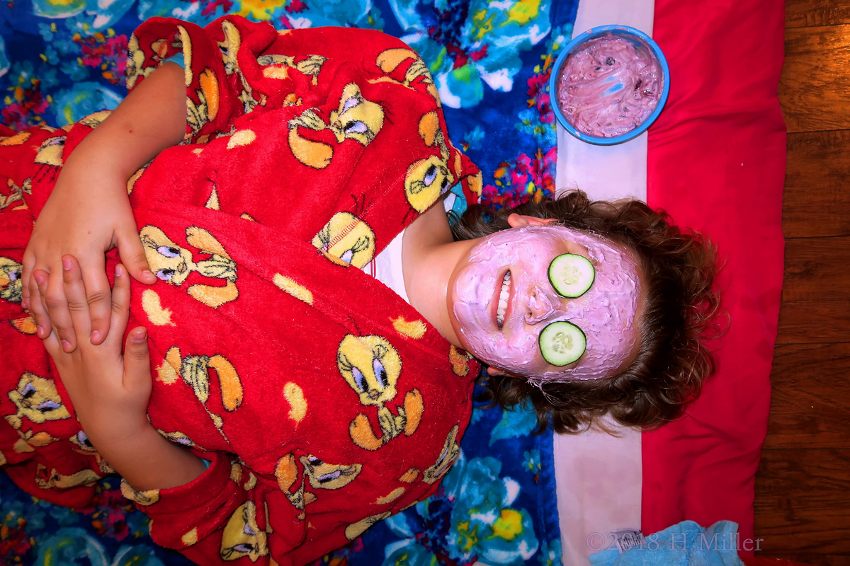 Big Smile During Kid Facials With Cukes On The Eyes! 