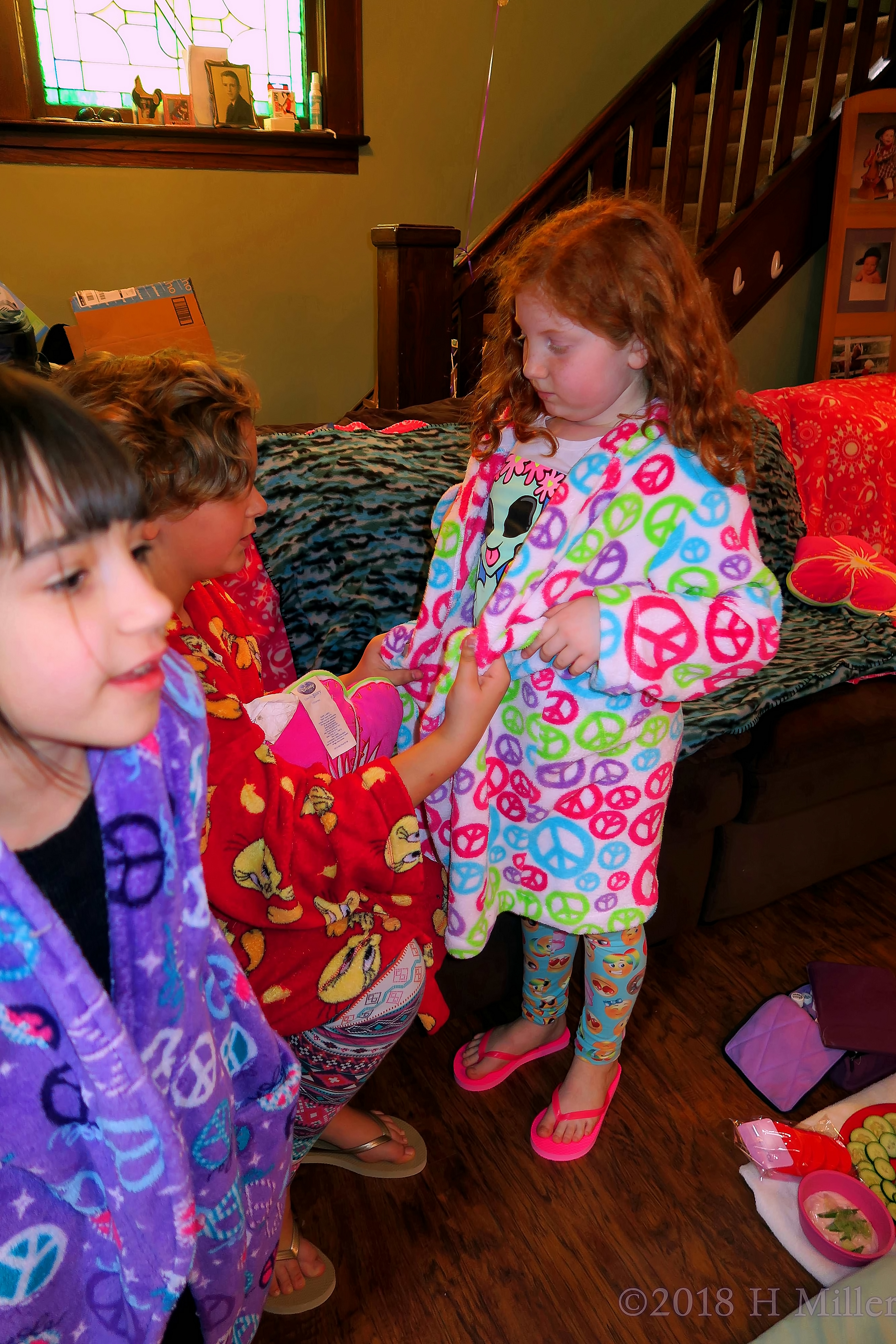 Helping Each Other With The Spa Robes Helping Each Other With The Spa Robes