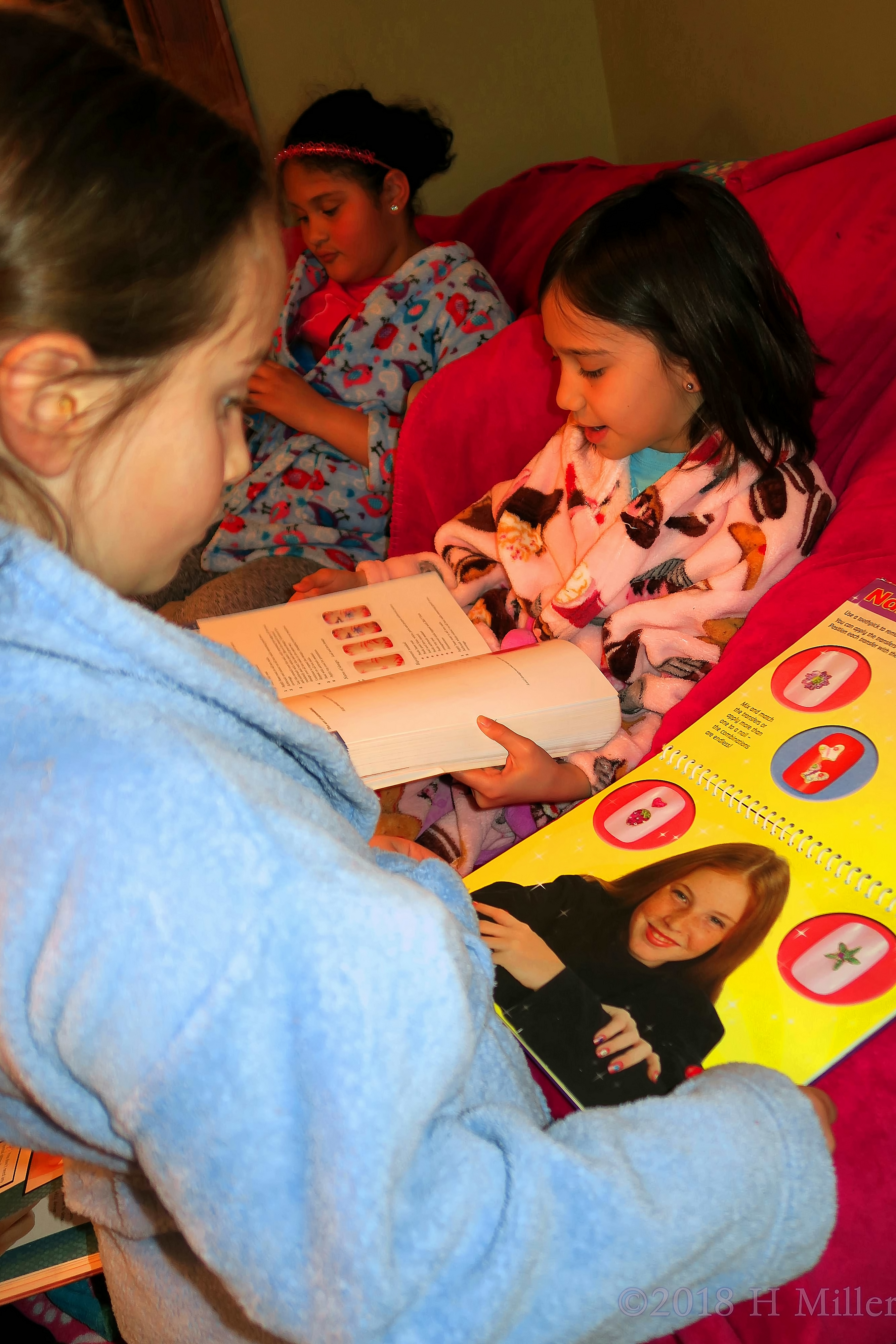 Three Spa Girls Learning About Available Kids Spa Nail Designs. 