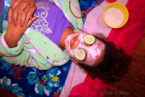 Cukes During Kids Facial Applied, Relaxation Imminent...