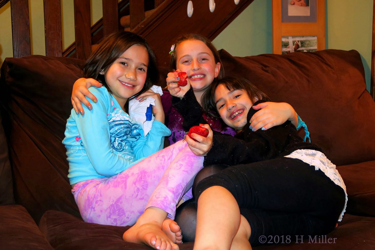 Happy Friends Eating Strawberries 