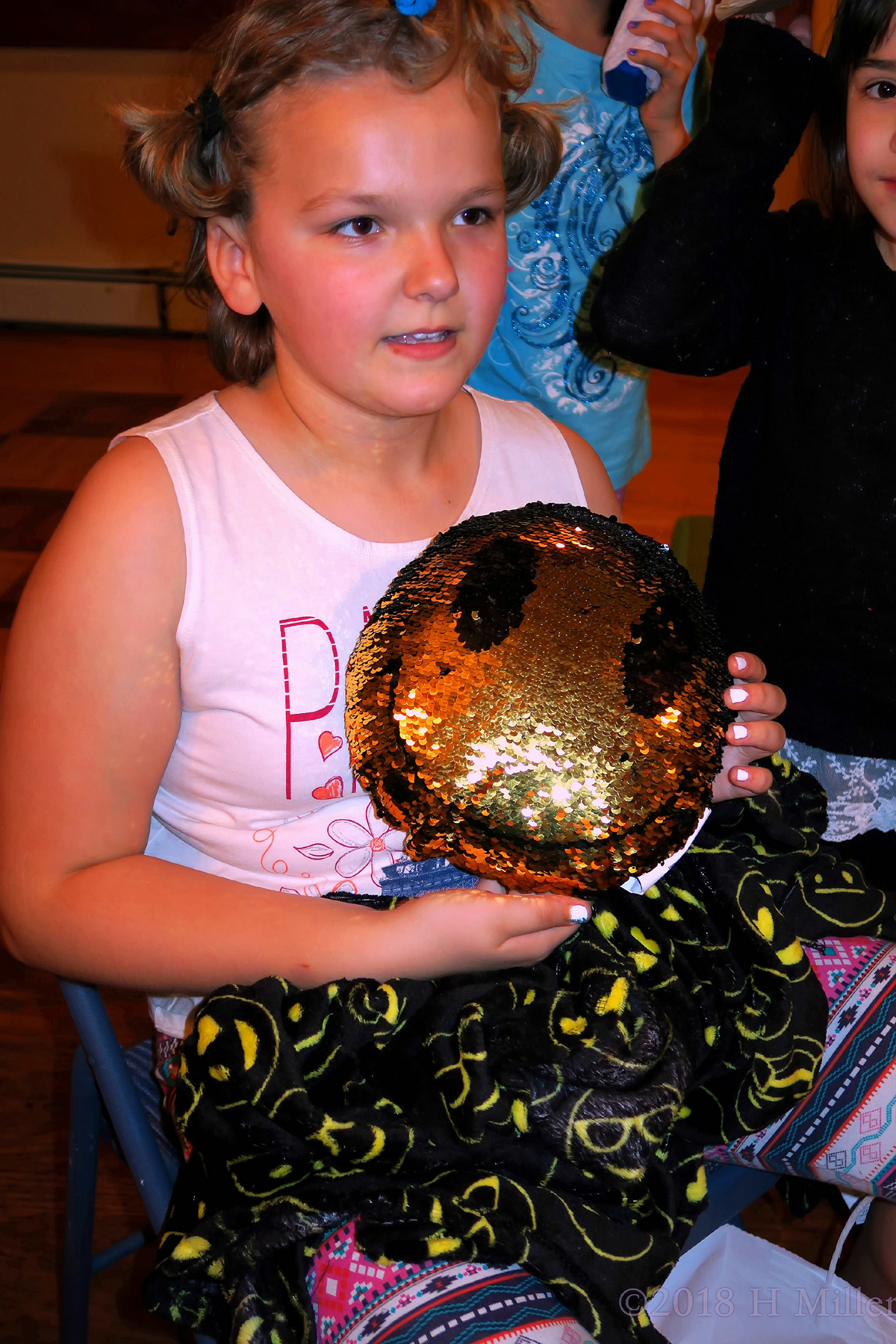 Holding A Sequined Happy Face Birthday Gift! 