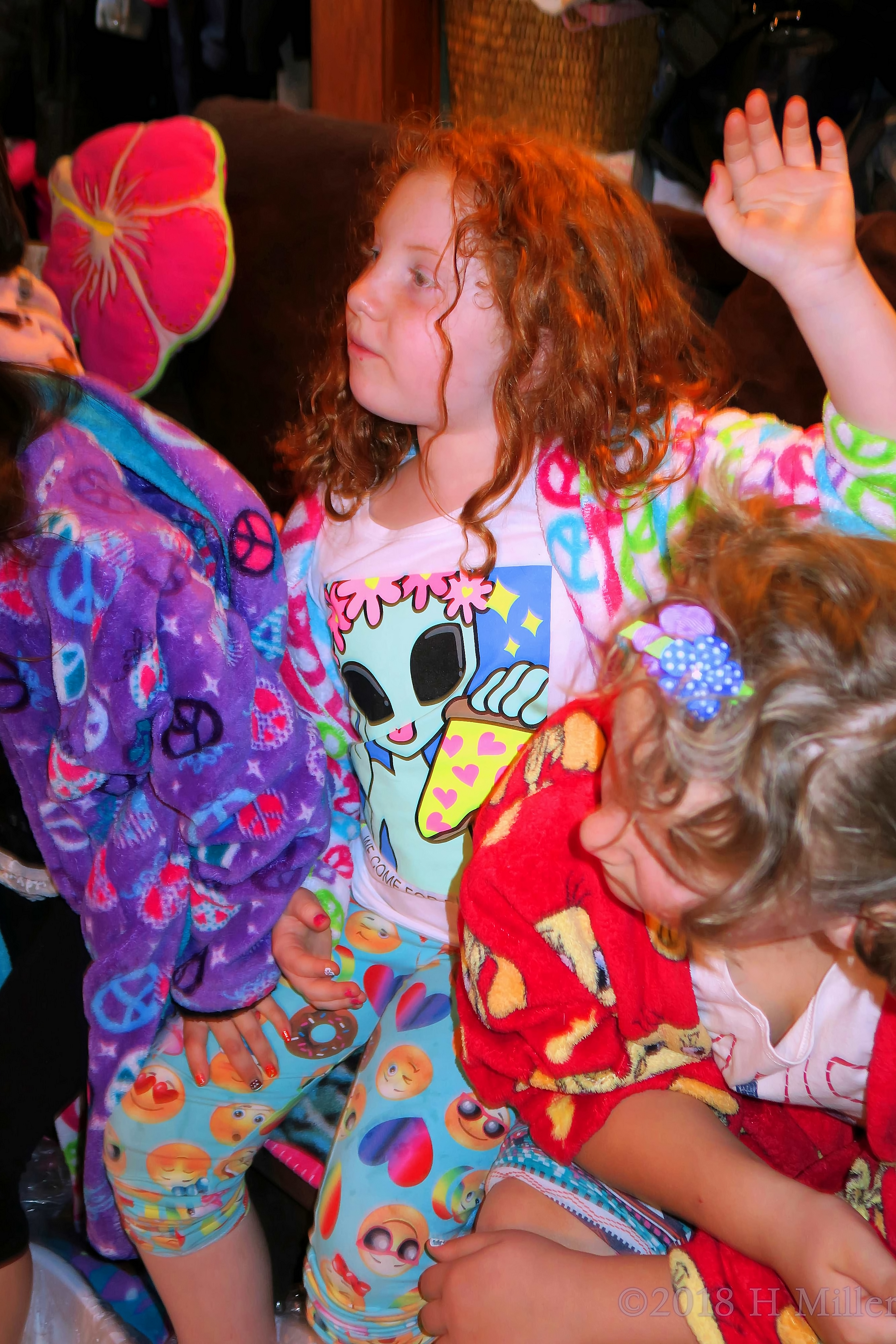 Colorfully Robed Party Girl Raises Her Hand. She Is Next! Colorfully Robed Party Girl Raises Her Hand. She Is Next!