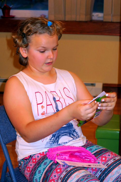 Madison Reads Her Card Madison Reads Her Card