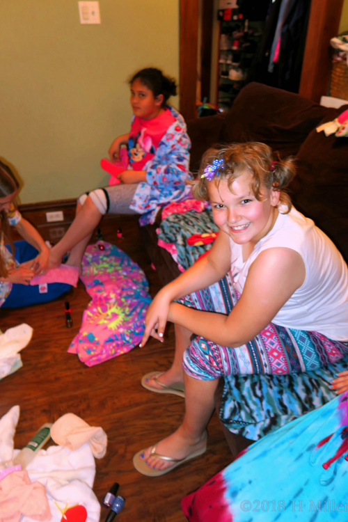 Madison Smiling While Her Friend Gets Her Kids Pedicure