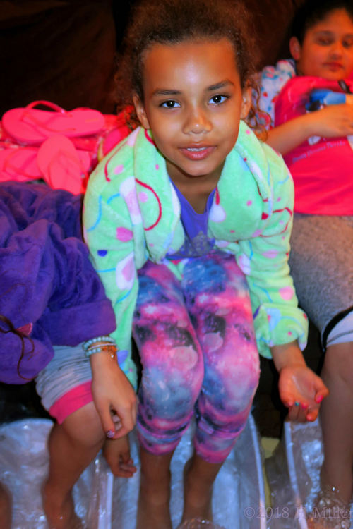 Sitting And Relaxing During The Kids Pedicure Foot Bath Sitting And Relaxing During The Kids Pedicure Foot Bath