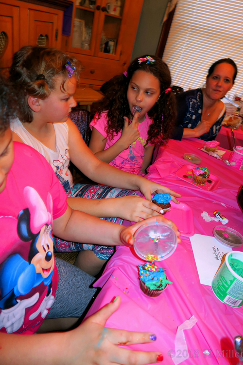 Sitting Together For Cupcakes.