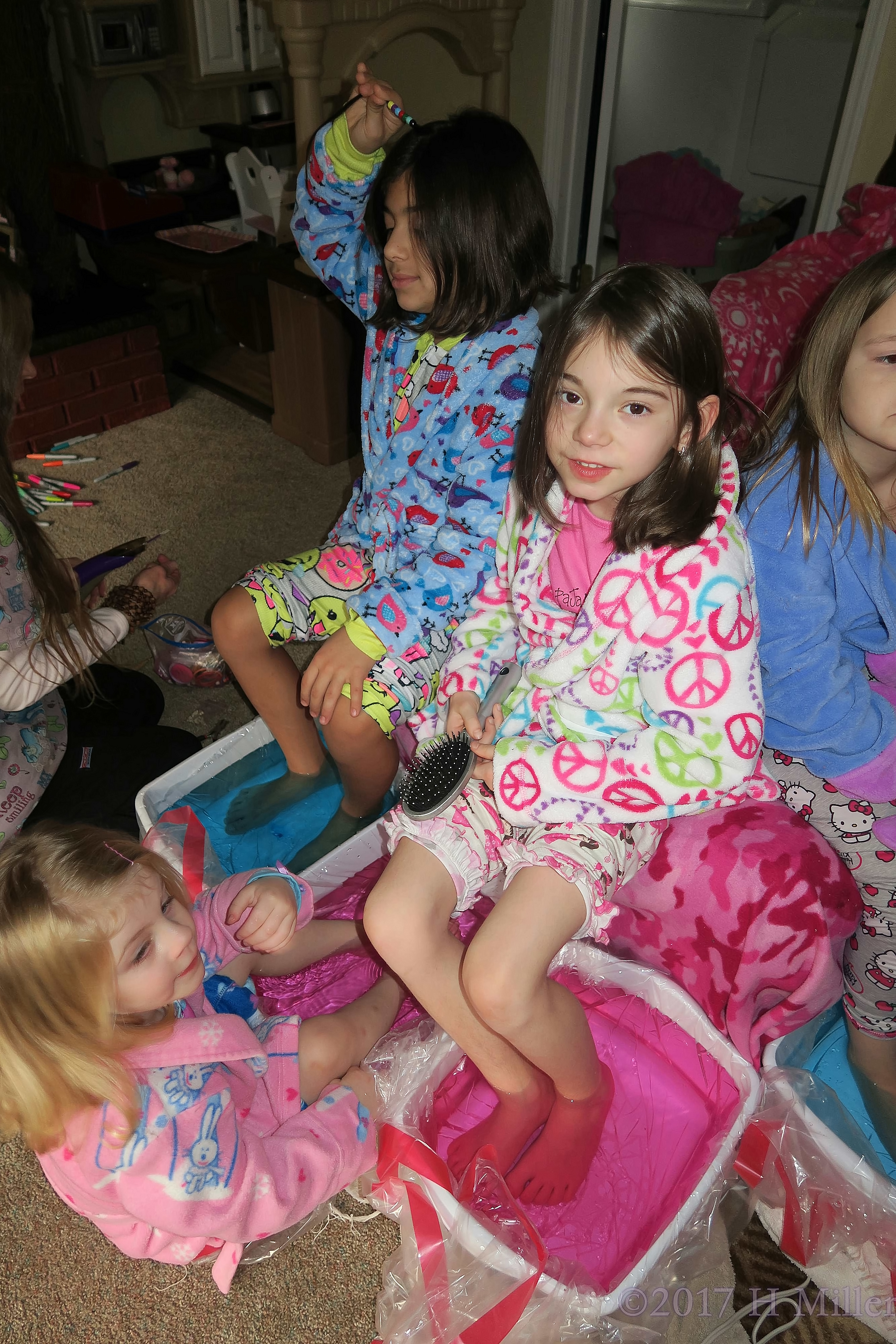The Birthday Girl And Friends Look Up Mid Pedi Footsoak The Birthday Girl And Friends Look Up Mid Pedi Footsoak