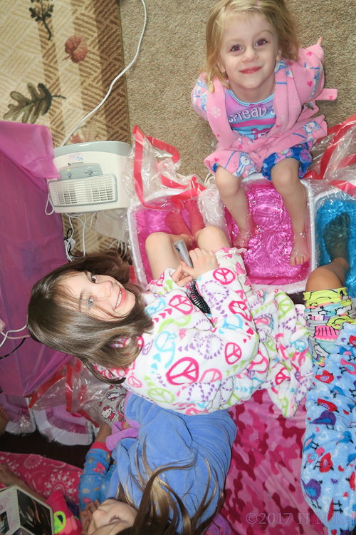 Smiling At The Camera During Girls Pedicure Footbaths! Smiling At The Camera During Girls Pedicure Footbaths!