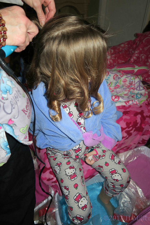 This Girls Hairstyle Is Complemented With Loose Curls This Girls Hairstyle Is Complemented With Loose Curls