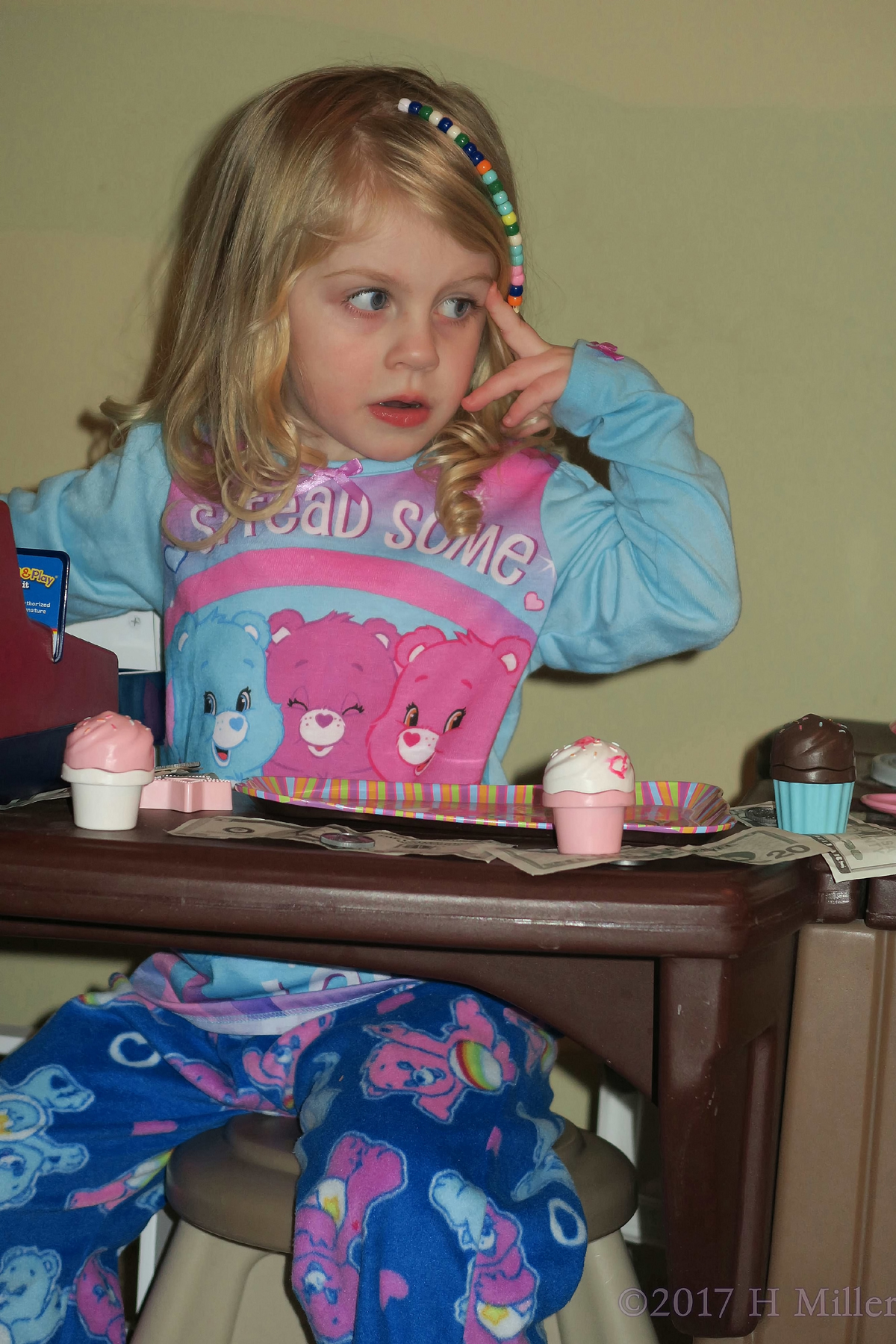 Checking Out Her Stylish Beaded Hairstyle During Dinner. 