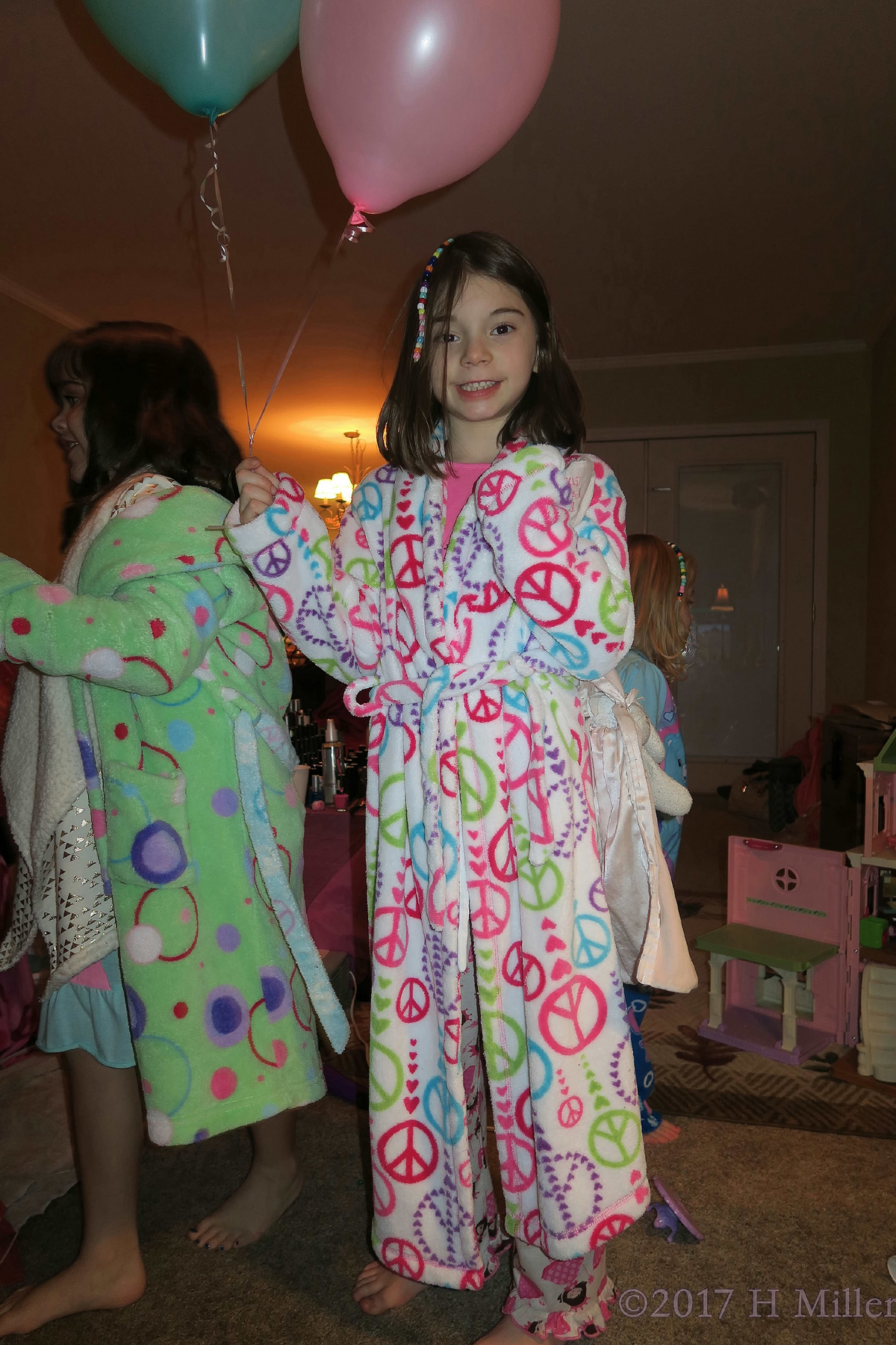 Madison And Her Friend With Balloons At The Birthday Party. 