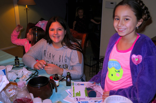 Girls Smile While Making Scented Bath Salts Girls Smile While Making Scented Bath Salts