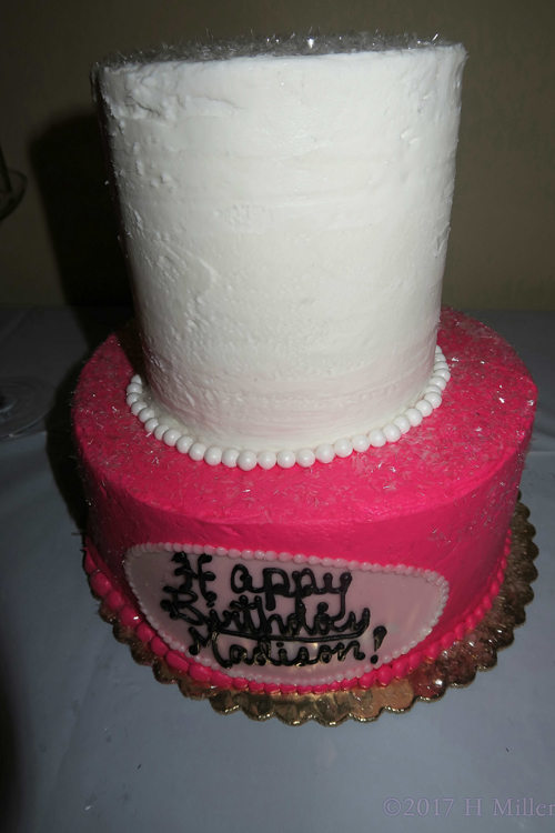 Pink And White Frosted Cake Lined With Matching Sugar Pearls, Shaped Like A Bottle Of Nail Polish For This Spa Party For Girls! 