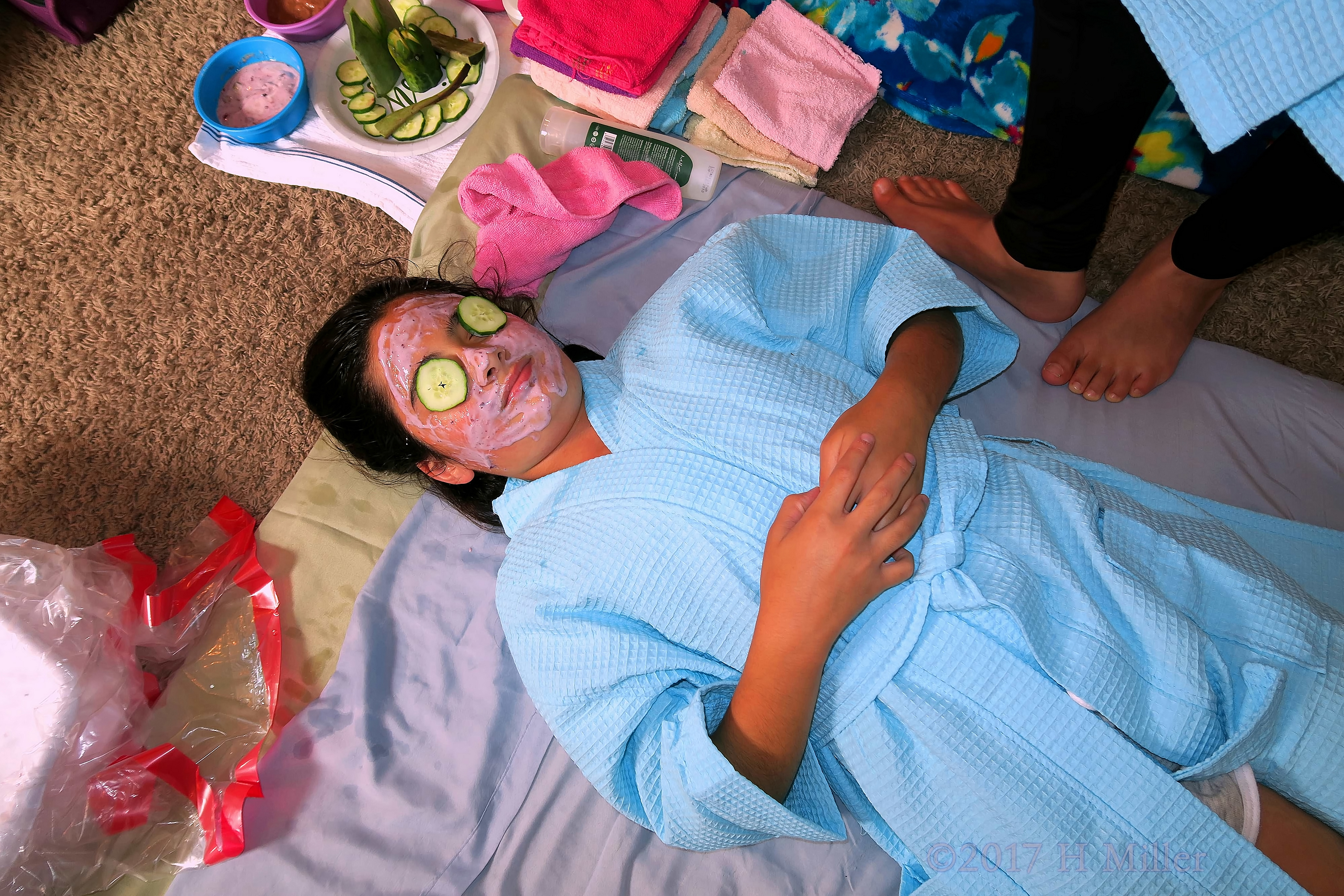 Enjoying Soothing Cucumber During Kids Facials At The Kids Spa! 