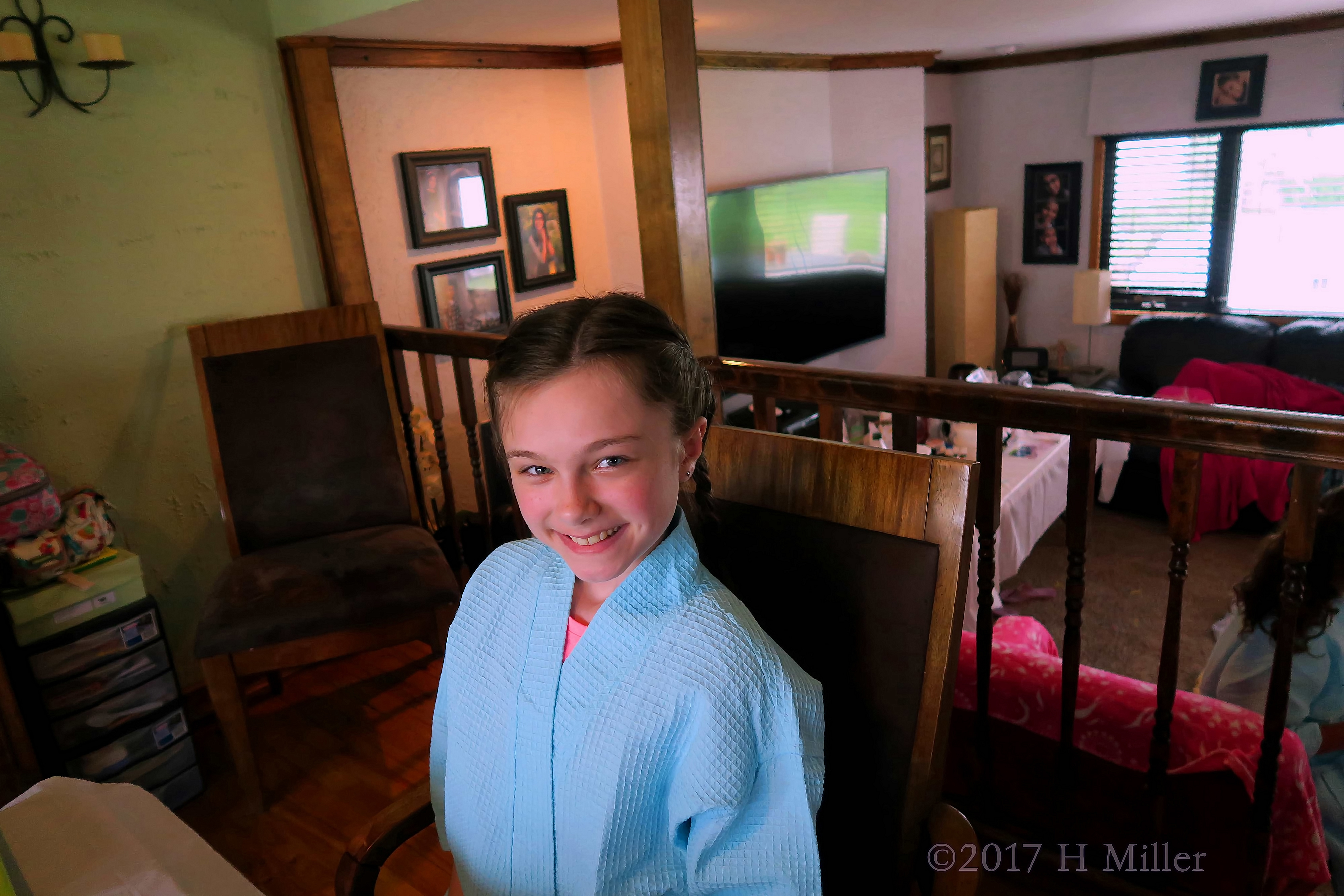 Smiling Party Guest With Her Beautiful Braid Girls Hairstyle. 