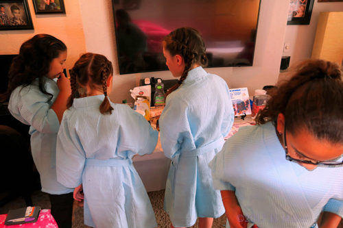 Girls Busy Preparing Kids Crafts At The Spa Party. Girls Busy Preparing Kids Crafts At The Spa Party.