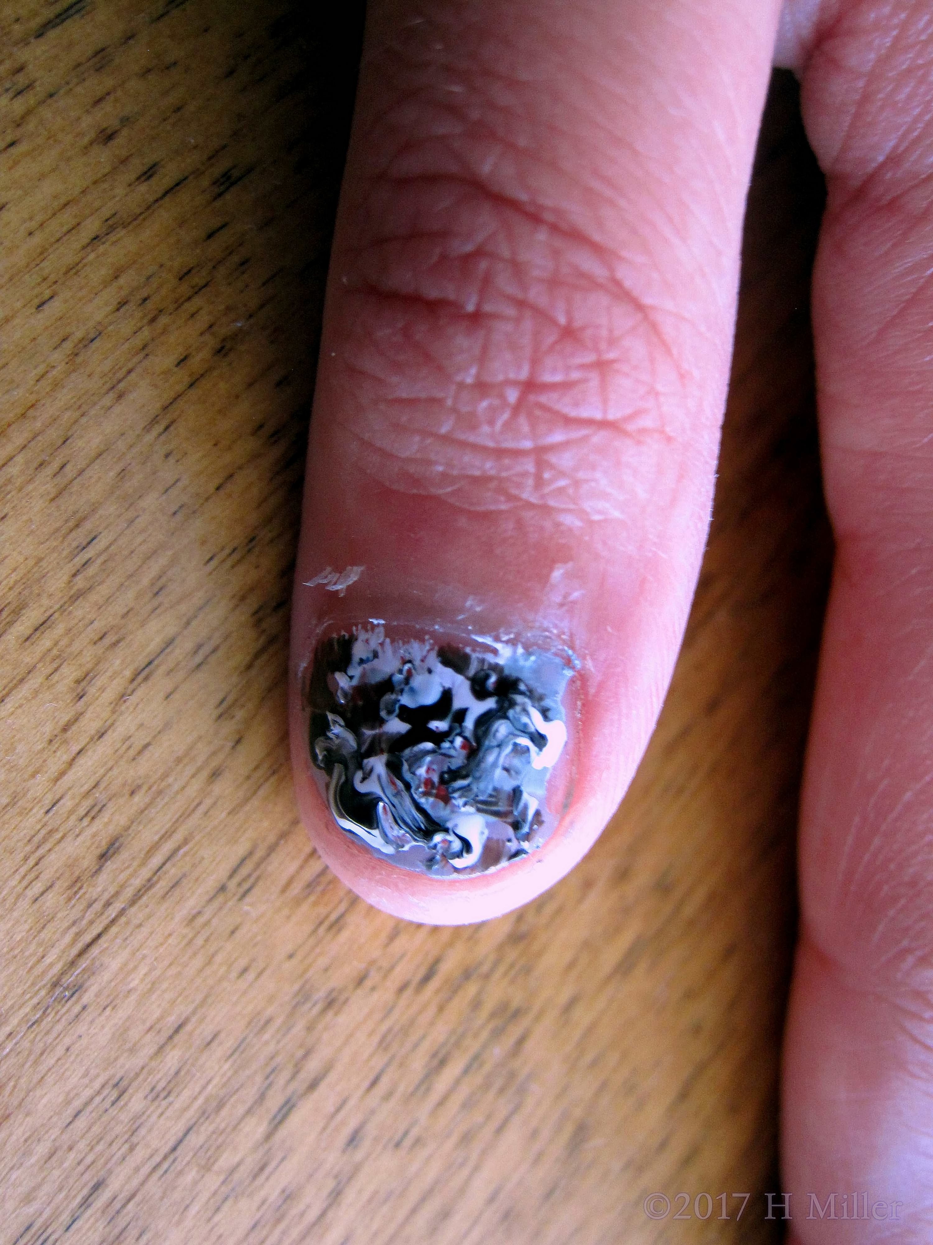 Mosaic Of Black, Gray And White Marbled Nail Design For This Kids Mani 