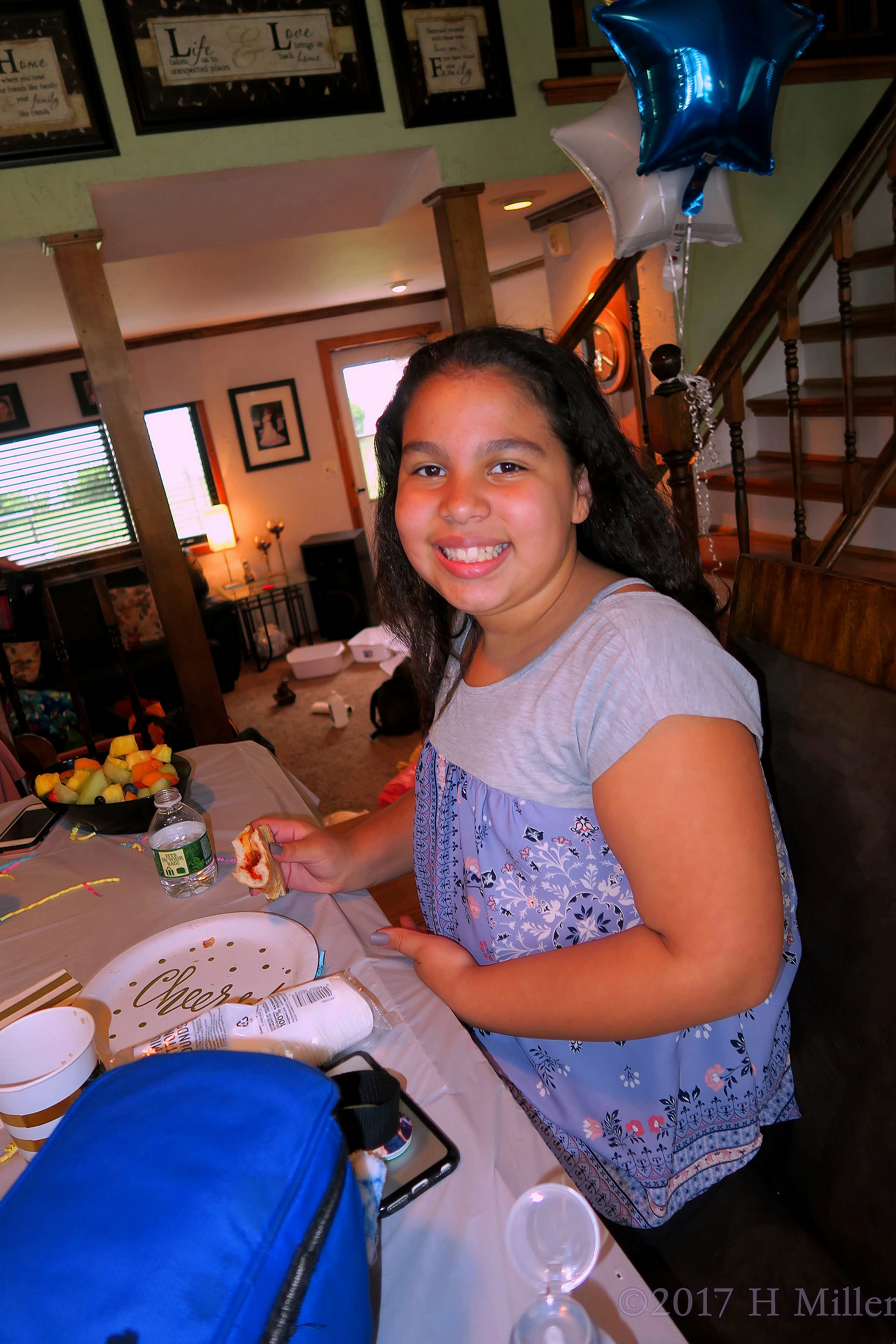 The Birthday Girl Smiling During Pizza And Snacks 