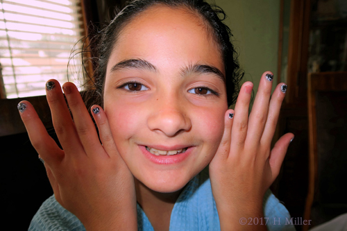 And Now Showing Her Mini Mani With A Smile