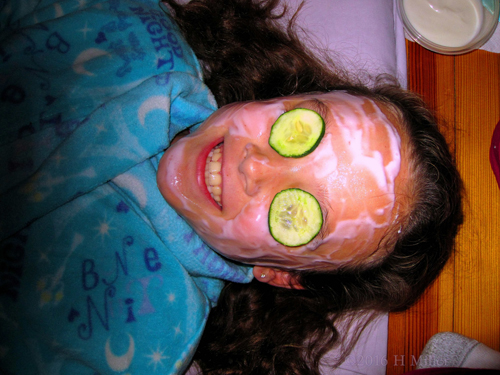 Smiling During Her Kids Facial Smiling During Her Kids Facial