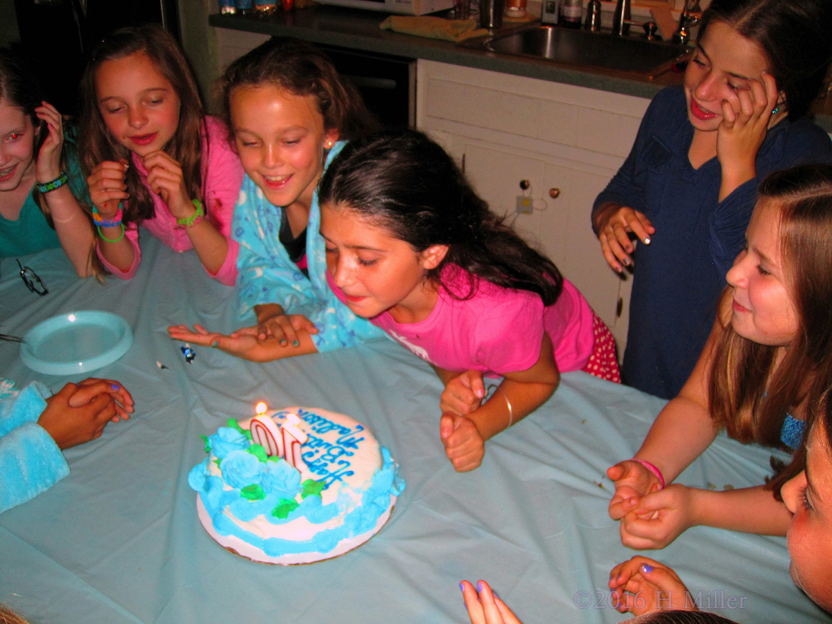 Watching The Birthday Girl Blow Out Her Candles