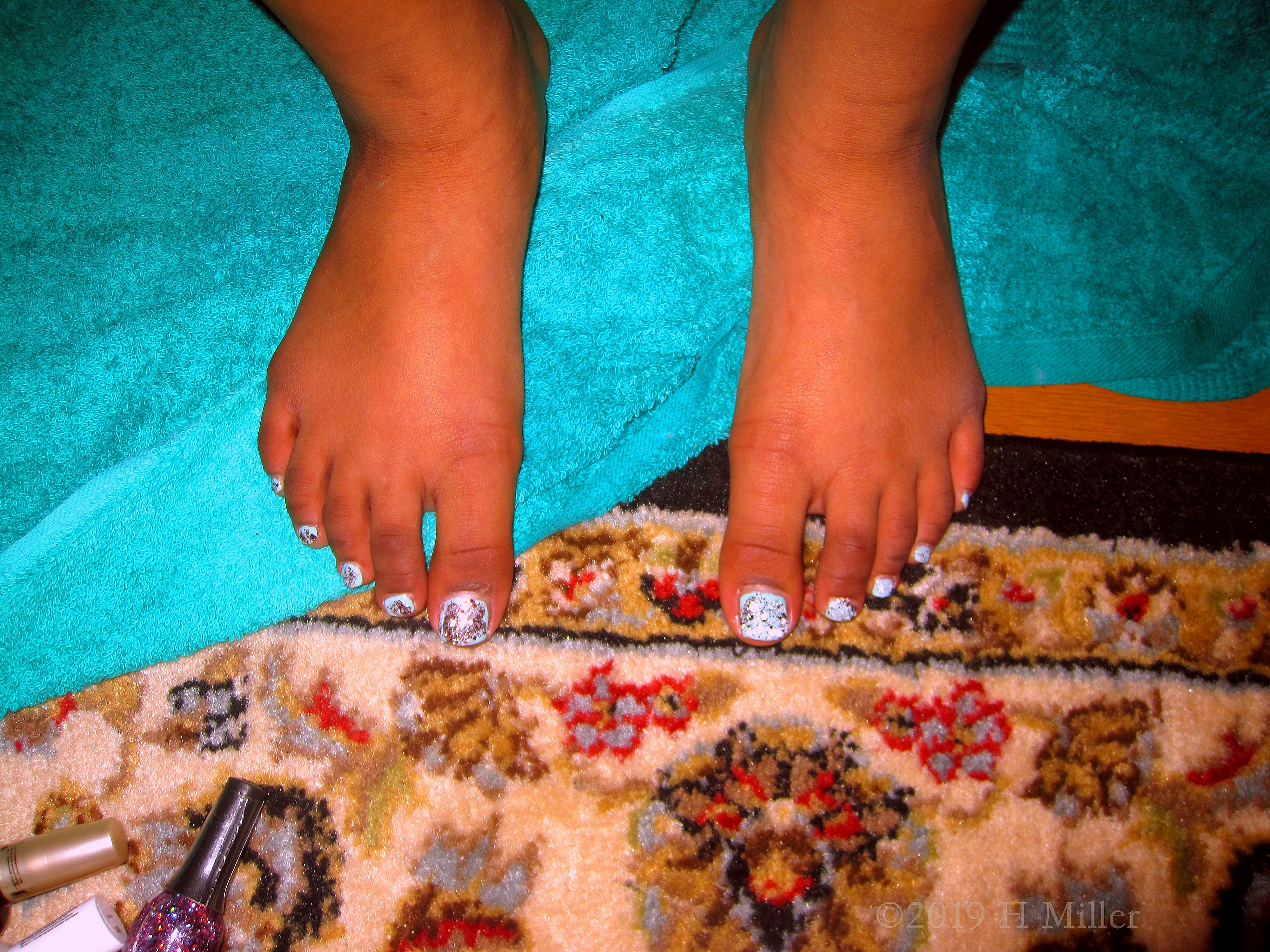 Cool Sparkles! She Is Showing Her Kids Pedicure! 