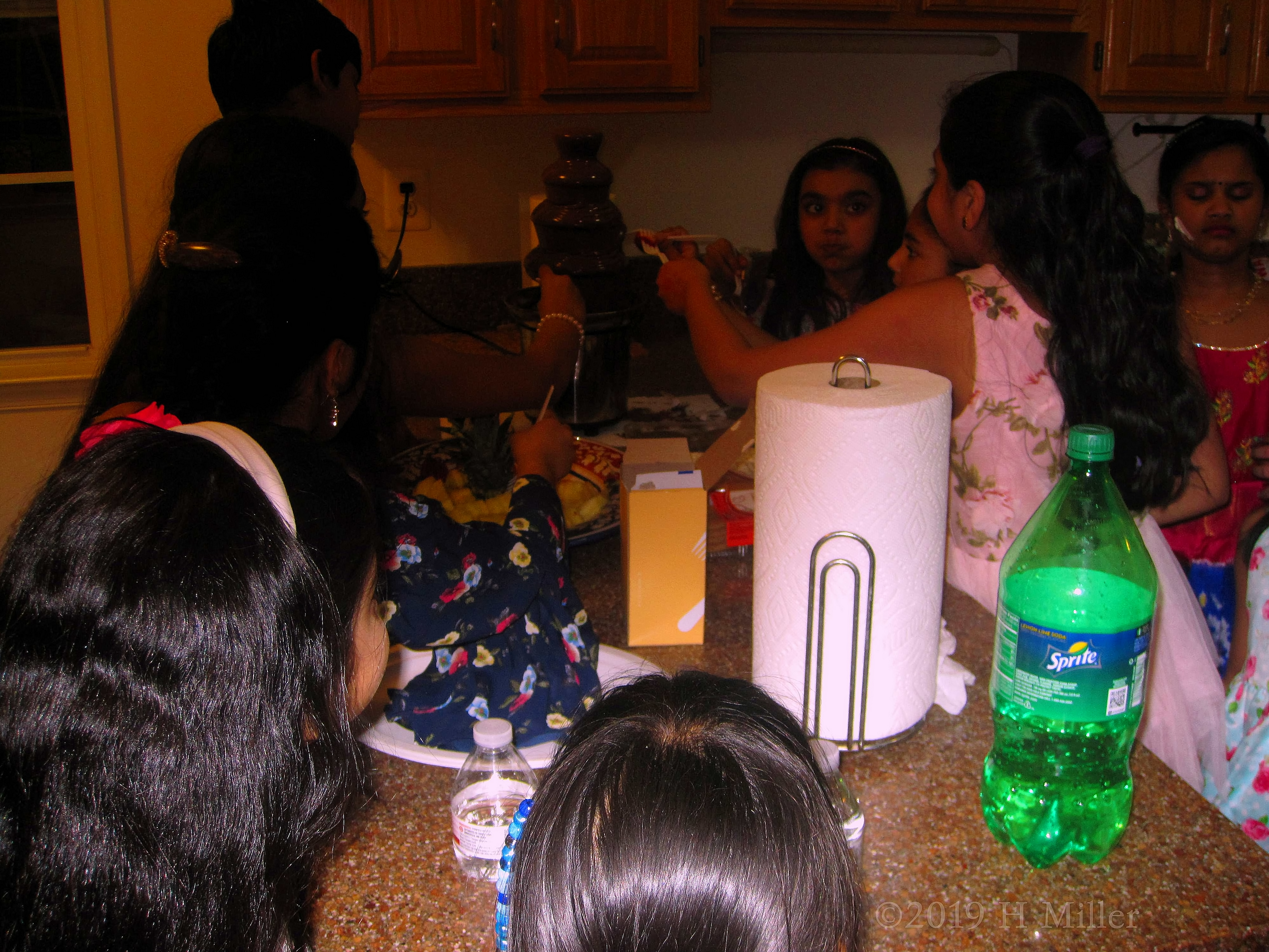 Everyone Is Enjoying The Chocolate Fountain 