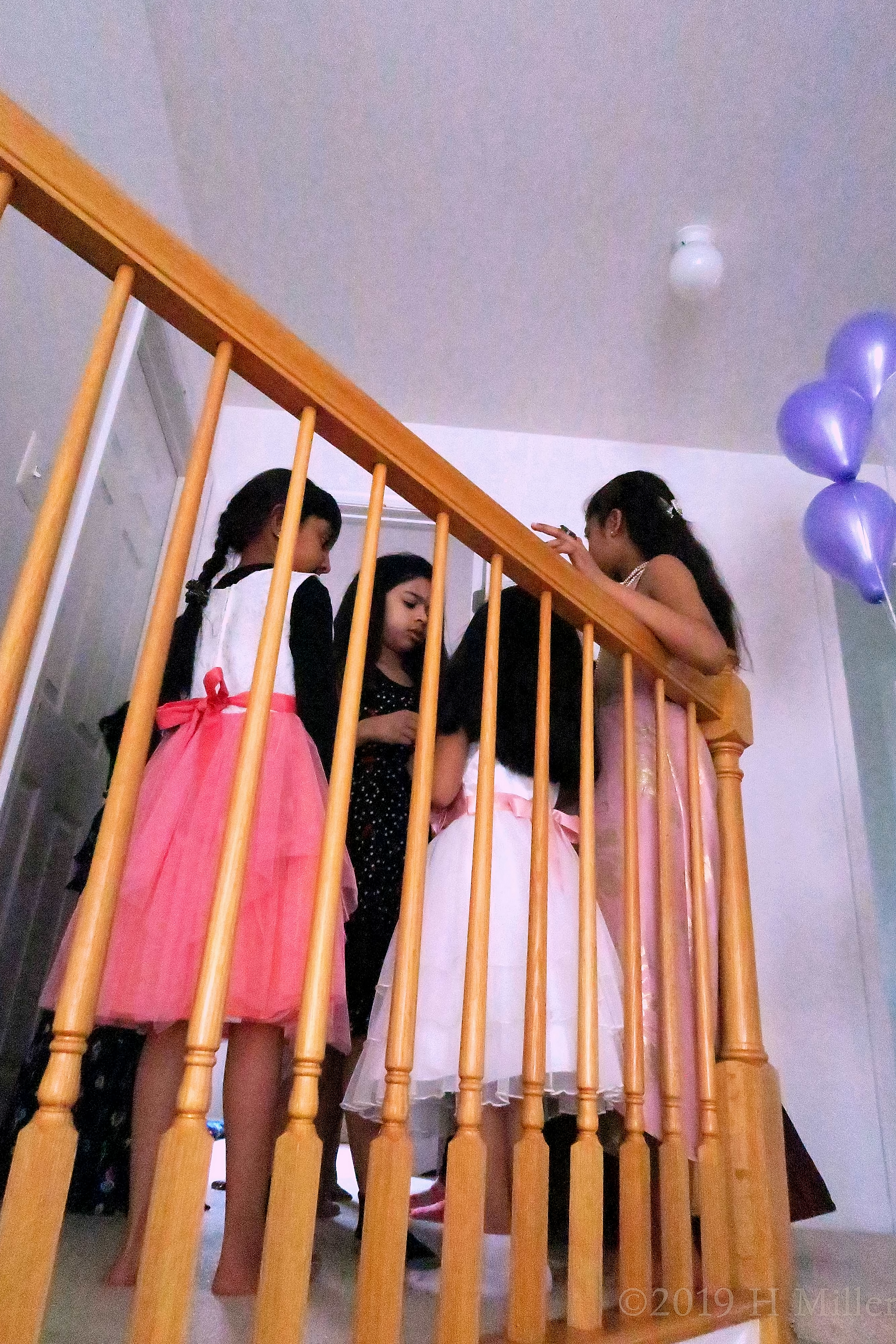 The Guests Are Having A Little Chit Chat On The Staircase 