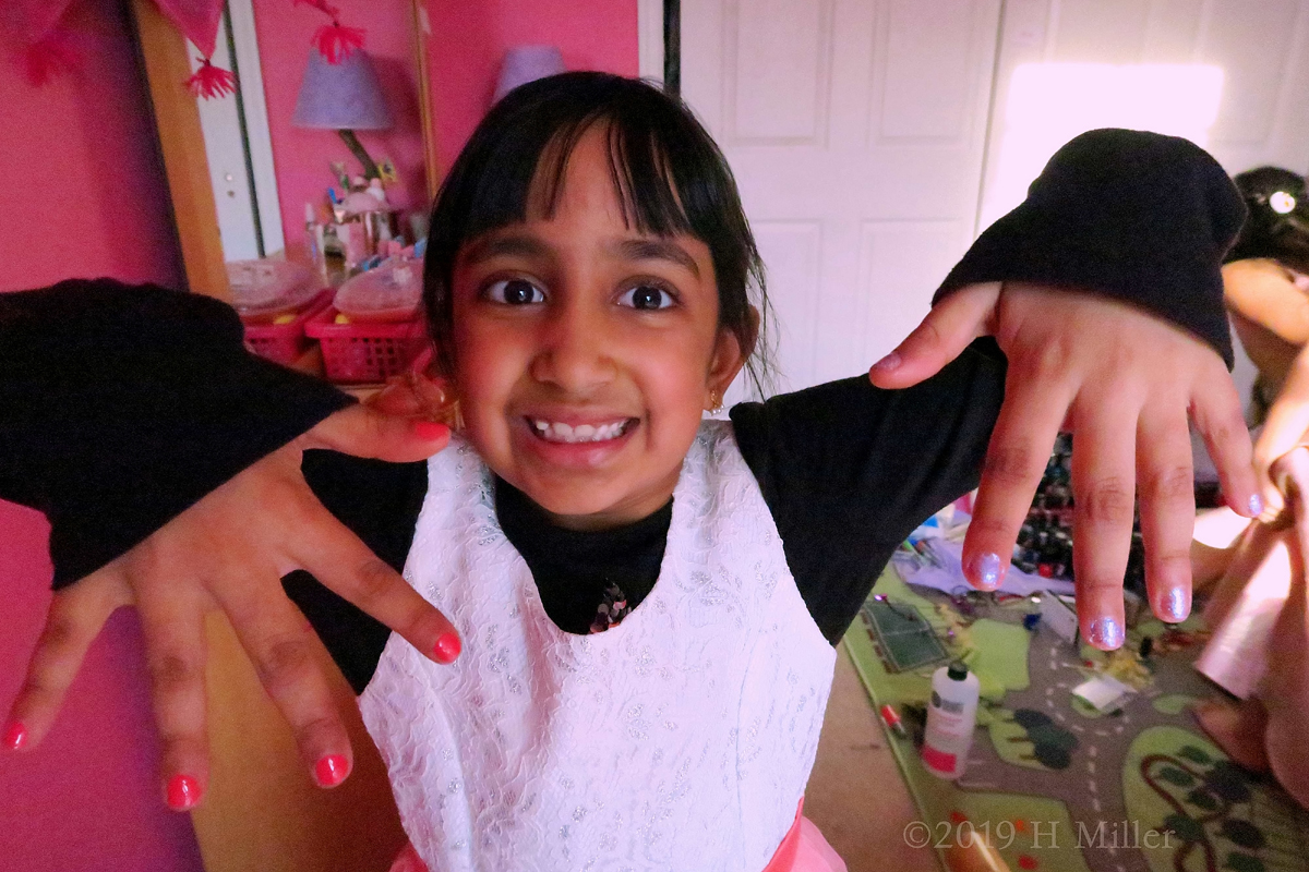 Can't Hide Her Excitement! Showing Her Cute Pink Nail Art. 