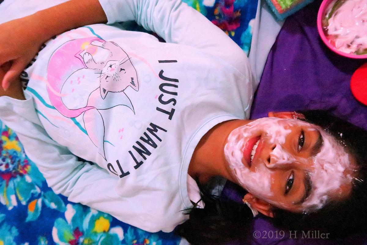 This Birthday Guest Takes A Pause To Pose For A Photo During Her Girls Facial 