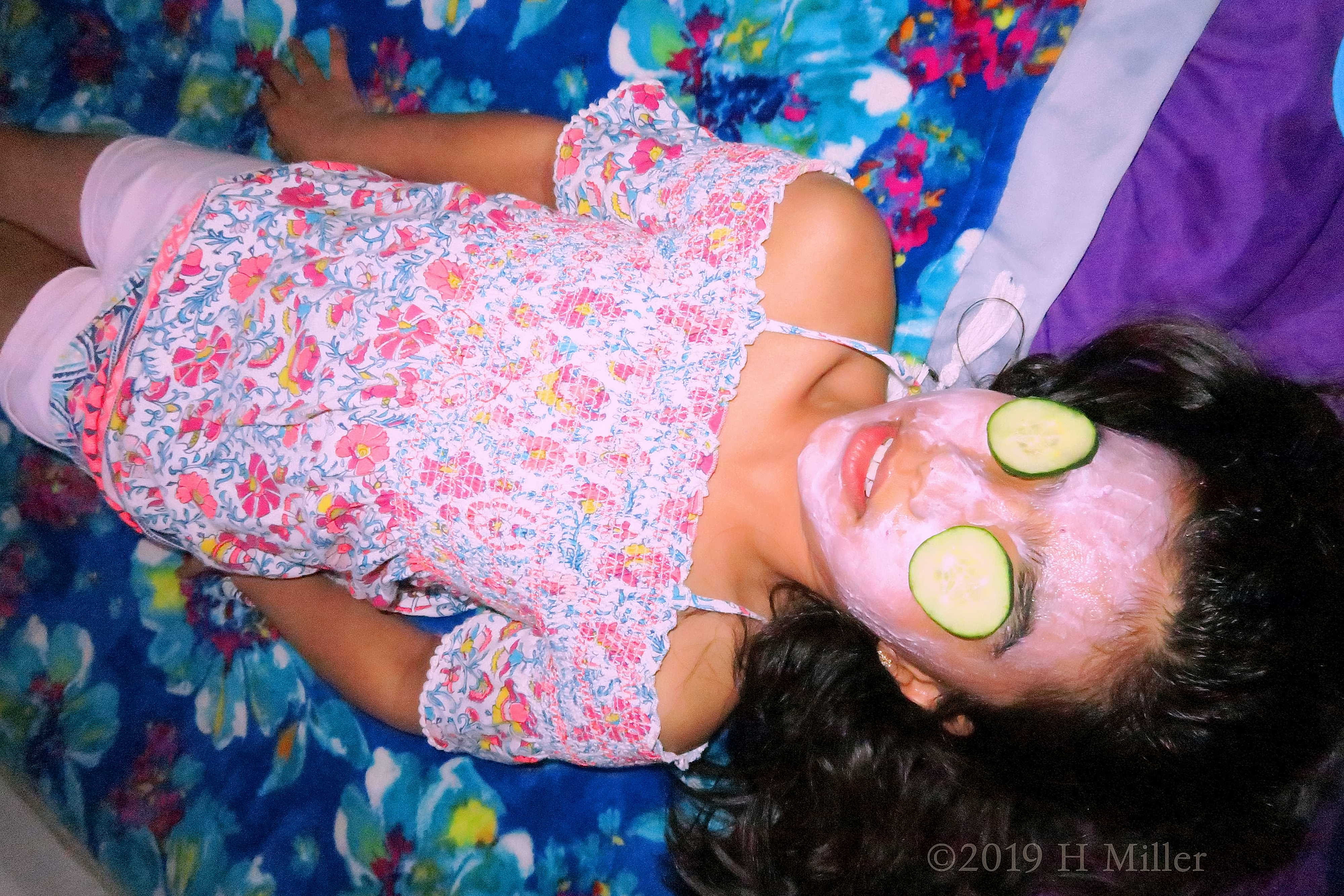 Smiling With Cukes On Her Eyes During Girls Facials 