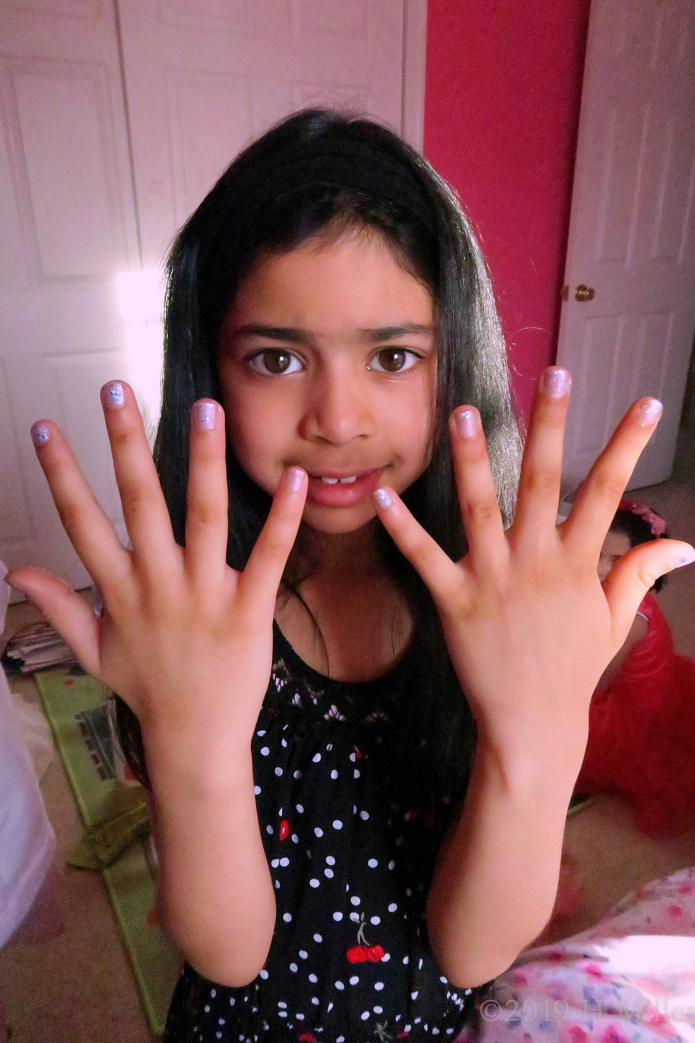 Wow! Awesome White Glittery Kids Manicure. 