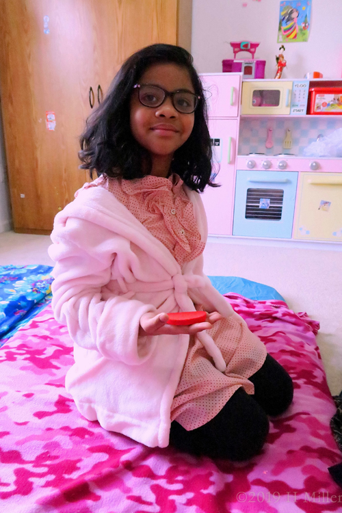 Cool! The Birthday Guest Looks Relaxed After Kids Facials In A Pink Spa Robe Cool! The Birthday Guest Looks Relaxed After Kids Facials In A Pink Spa Robe