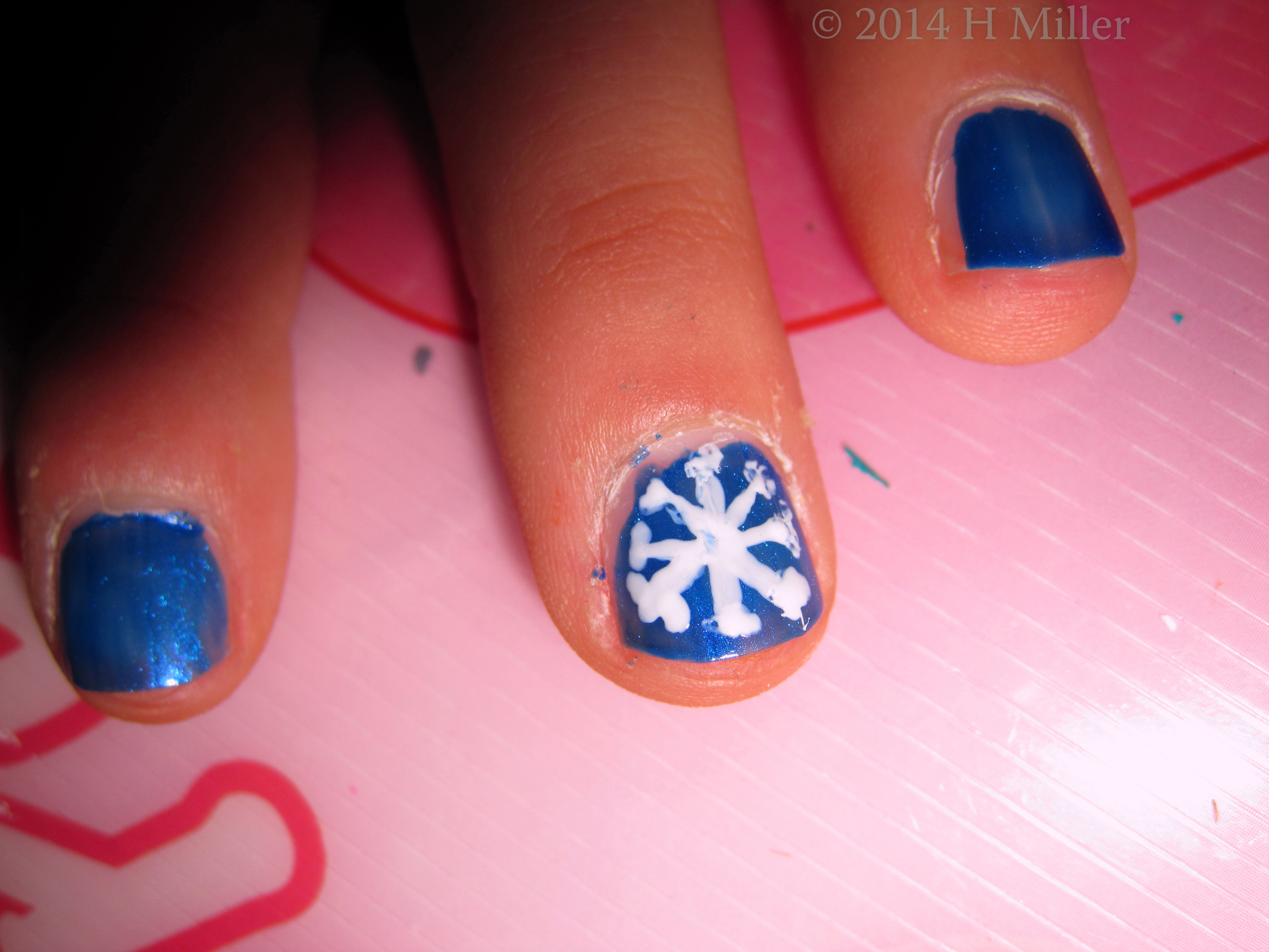 Nail Art Snowflake On Blue Background Nail Art Snowflake On Blue Background