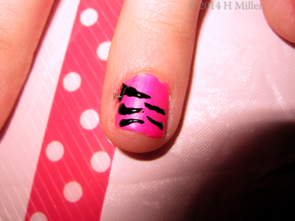 Closeup Of Hot Pink Nail Art With Black Stripes 