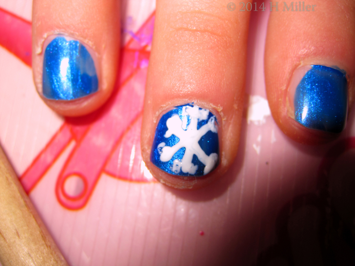 Closeup Of Snowflake Nail Art 