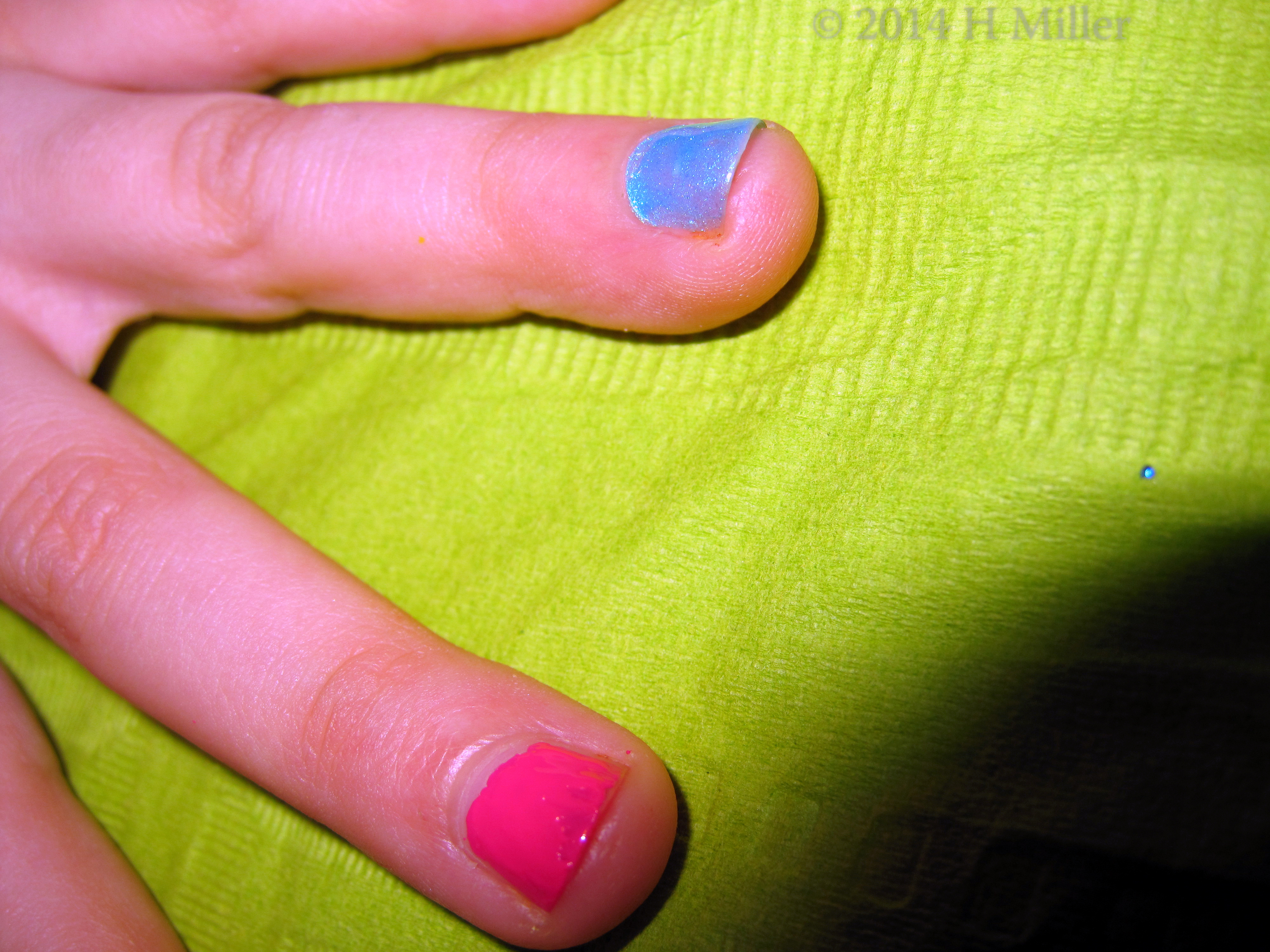 Blue Metallic Amazing Color Nail Polish Close Up Blue Metallic Amazing Color Nail Polish Close Up