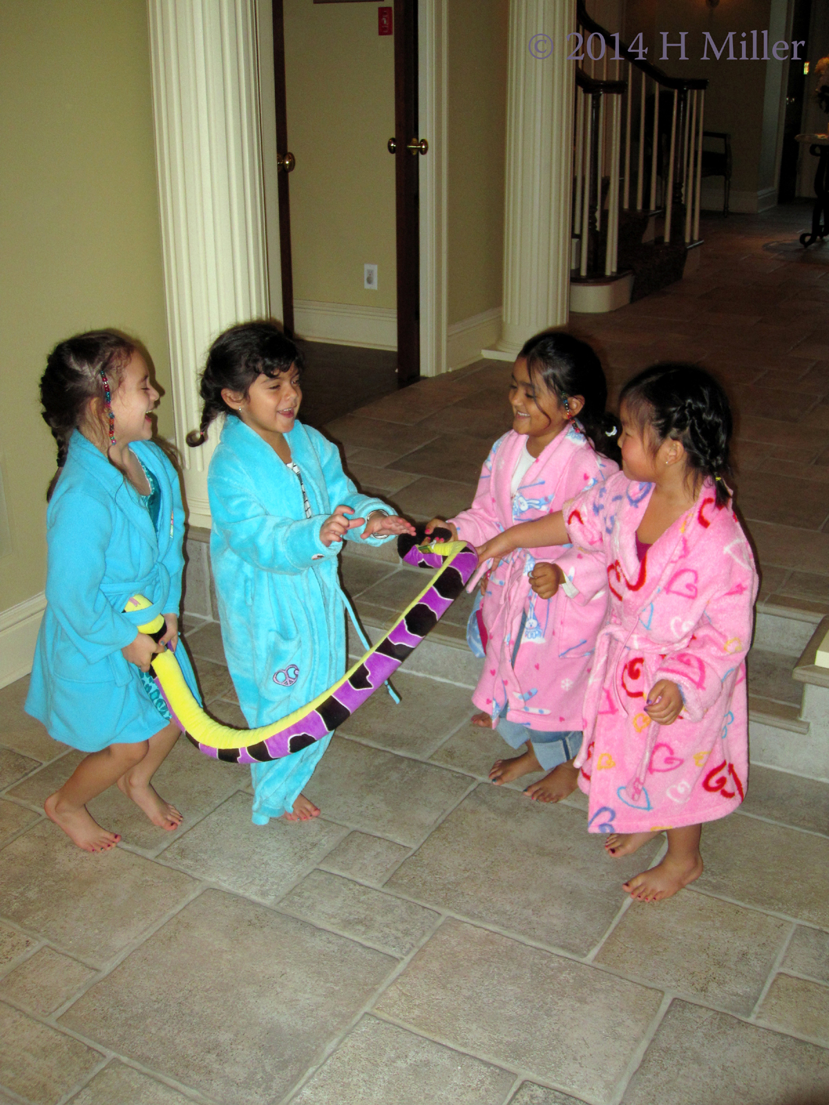 The Birthday Girl And Friends Dancing And Playing Together. The Birthday Girl And Friends Dancing And Playing Together.