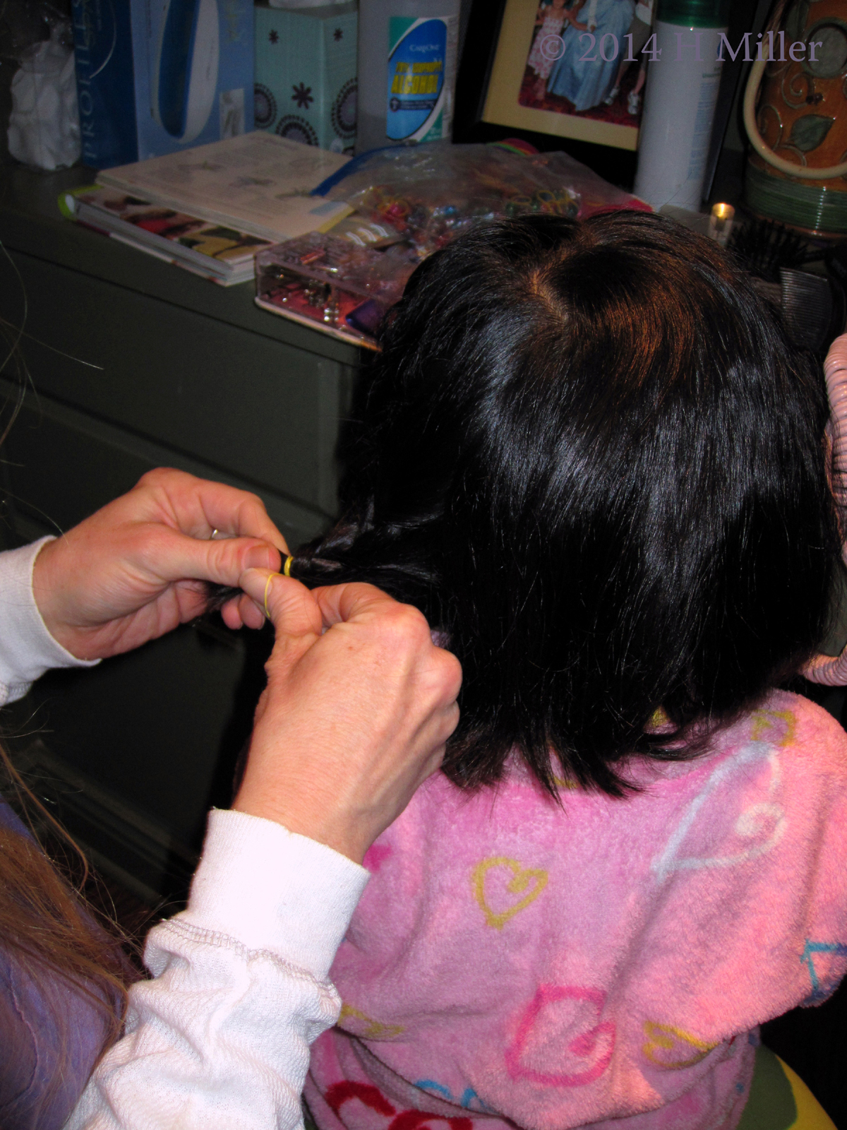 Styling The Hair Of a Girls Spa Party Guest Styling The Hair Of a Girls Spa Party Guest