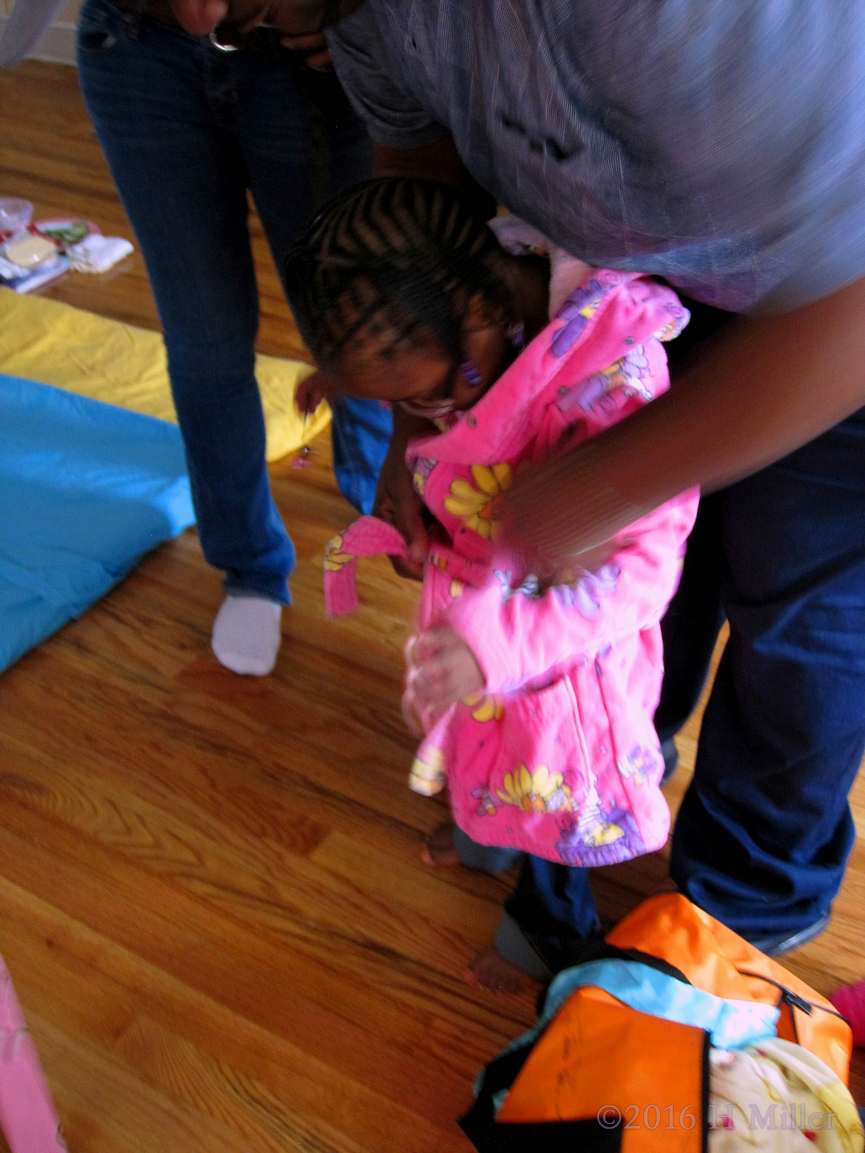 Putting On Her Pink Spa Robe 