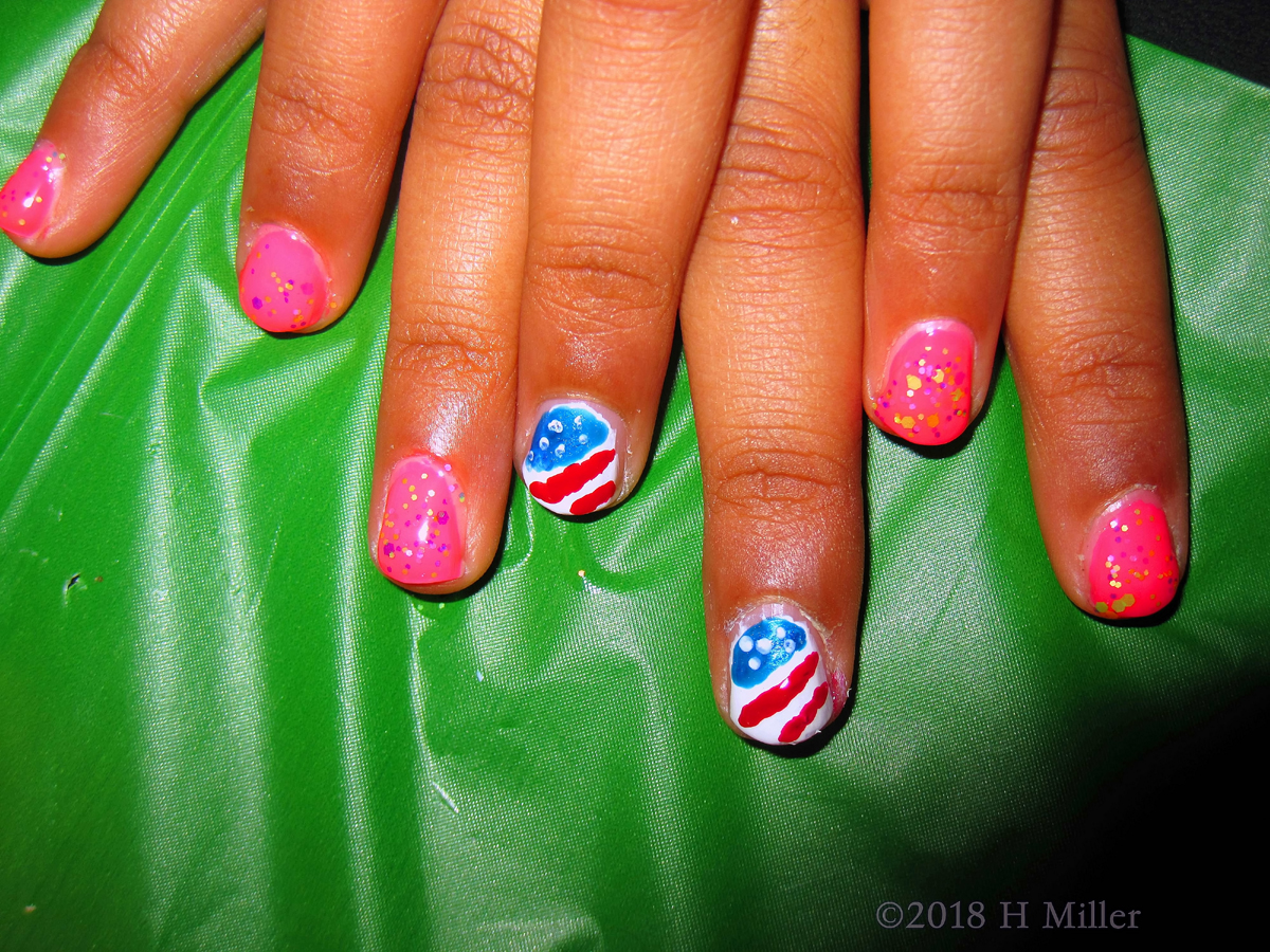 Pink Kids Manicure With Sparkles And Accent Nail Art With American Flag 