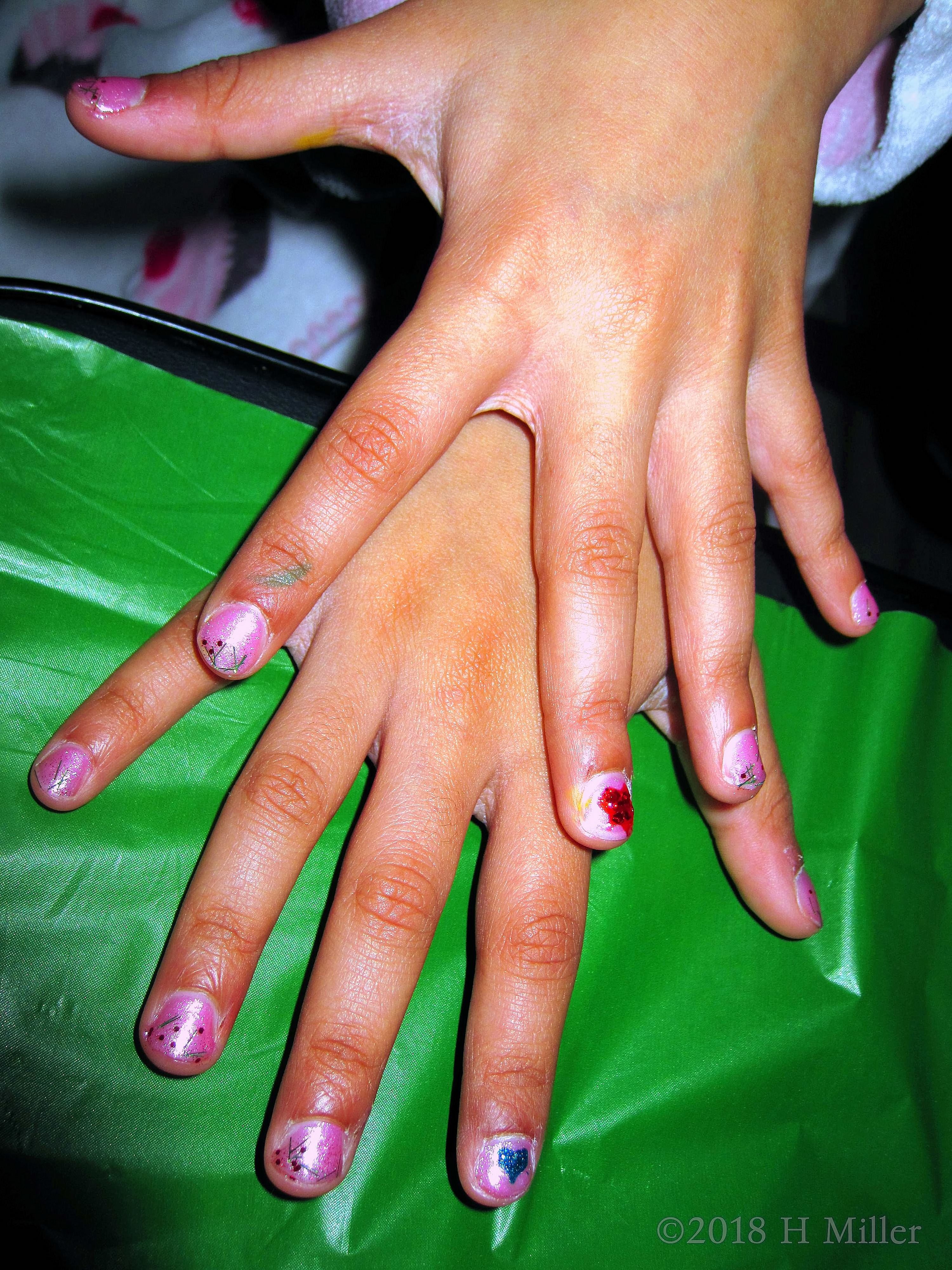 Beautiful Blush Pink Kids Manicure With Decorative Heart Nail Art Overlay Beautiful Blush Pink Kids Manicure With Decorative Heart Nail Art Overlay