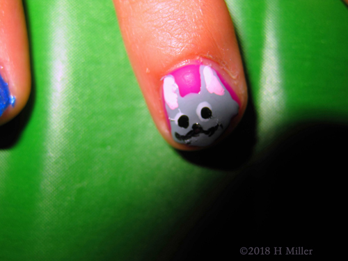 Accent Nail With Pink Base Polish And Mouse Overlay Kids Nail Art Design