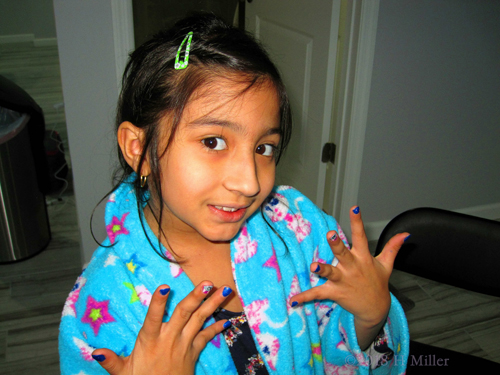 Showing Off Her Kids Manicure With Nail Design In Her Comfy Spa Robe Showing Off Her Kids Manicure With Nail Design In Her Comfy Spa Robe