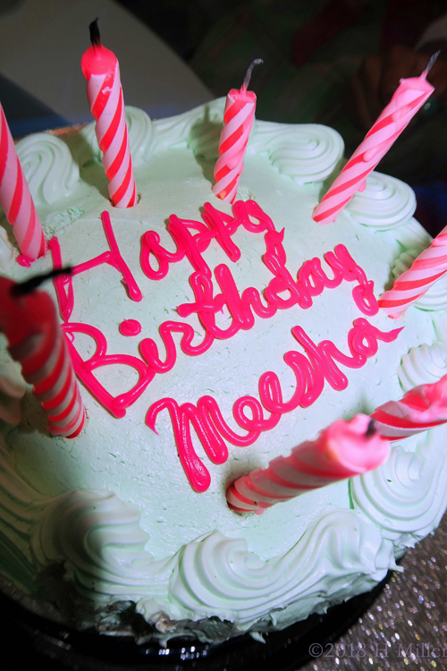 Mint Green And Pink Frosting On Cake With Decorative Candles Mint Green And Pink Frosting On Cake With Decorative Candles