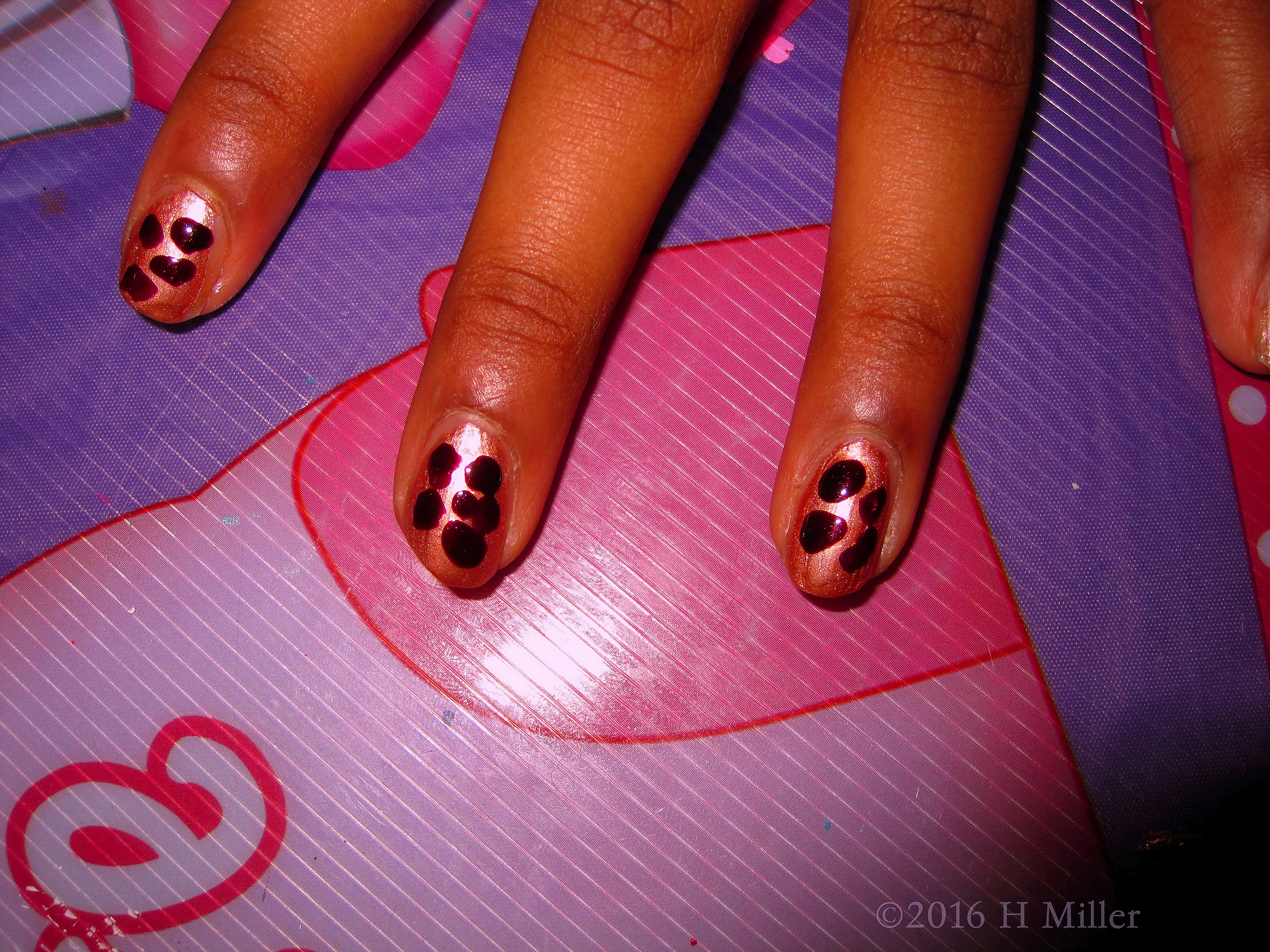 Manicure For Kids With Dark Cow Spot Nail Art On Light Pink Manicure For Kids With Dark Cow Spot Nail Art On Light Pink