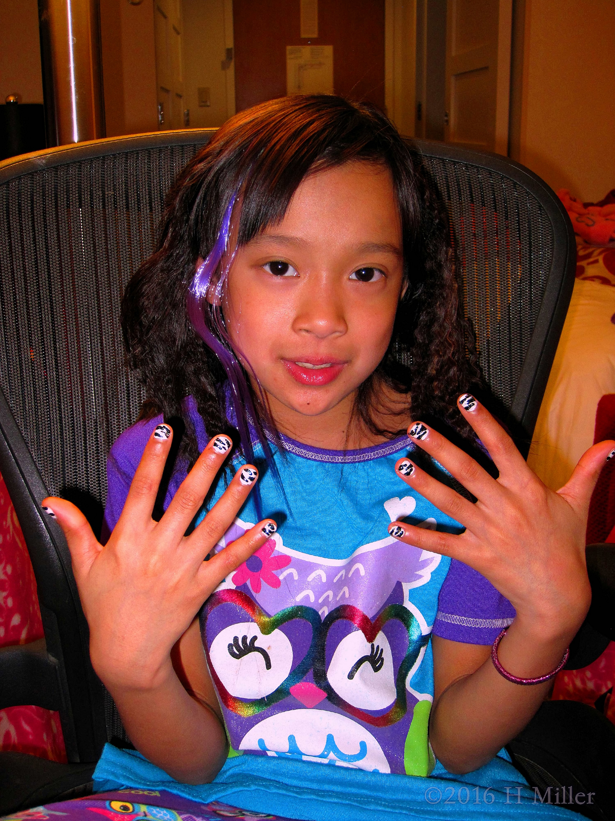 Mei Li With Zebra Nail Design On Her Kids Manicure 